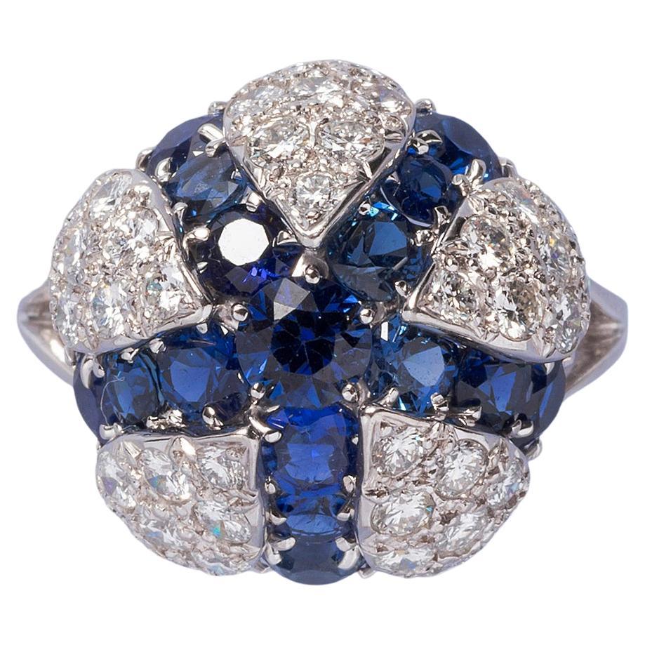Platinum Diamond and Sapphire Flower Cartier Ring For Sale