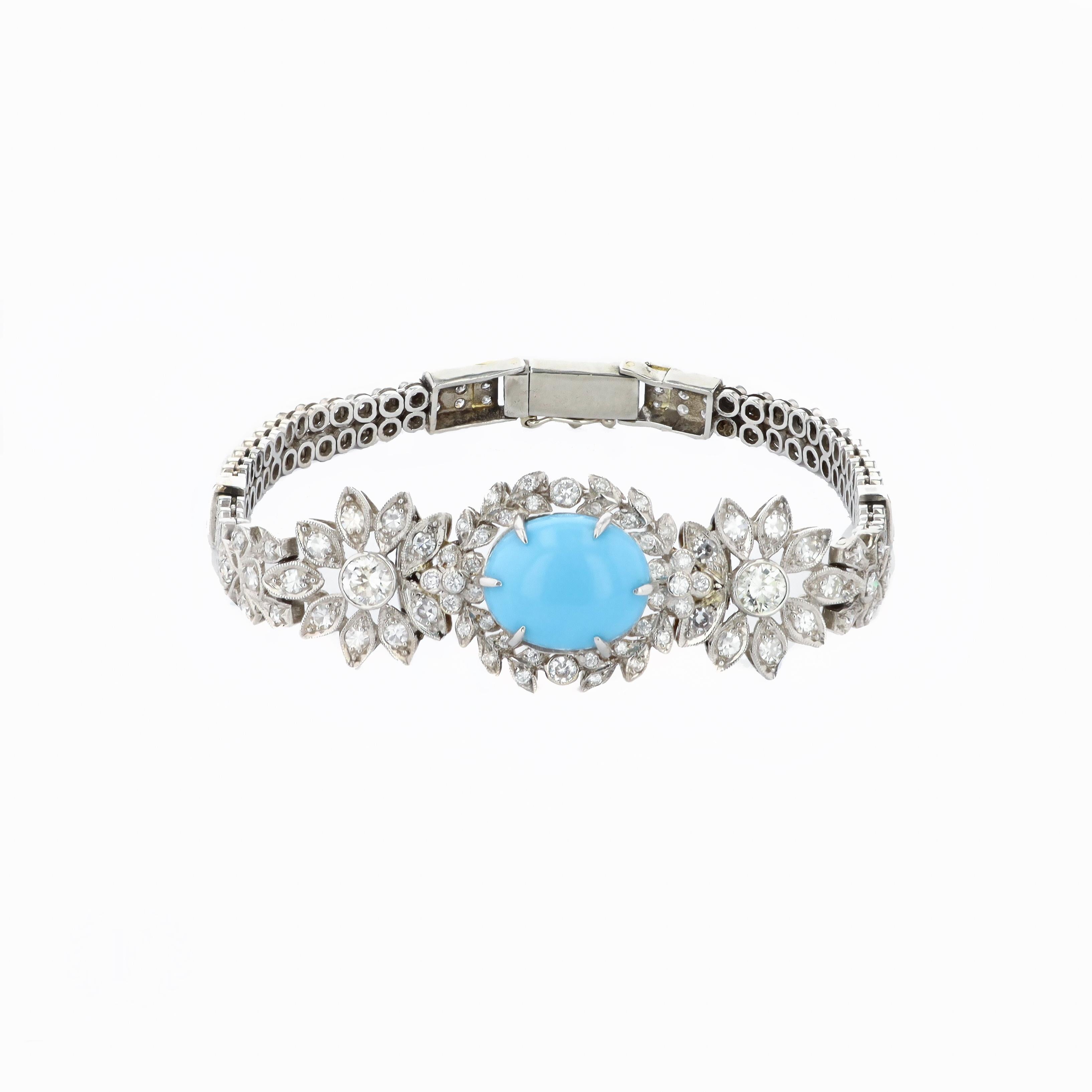 One platinum and diamond estate bracelet containing one cabochon turquoise in the center, and 179 round and 2 baguette diamonds weighing approximately 4.00 carats