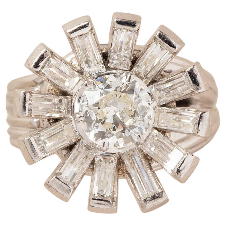 A platinum flower ring with diamonds