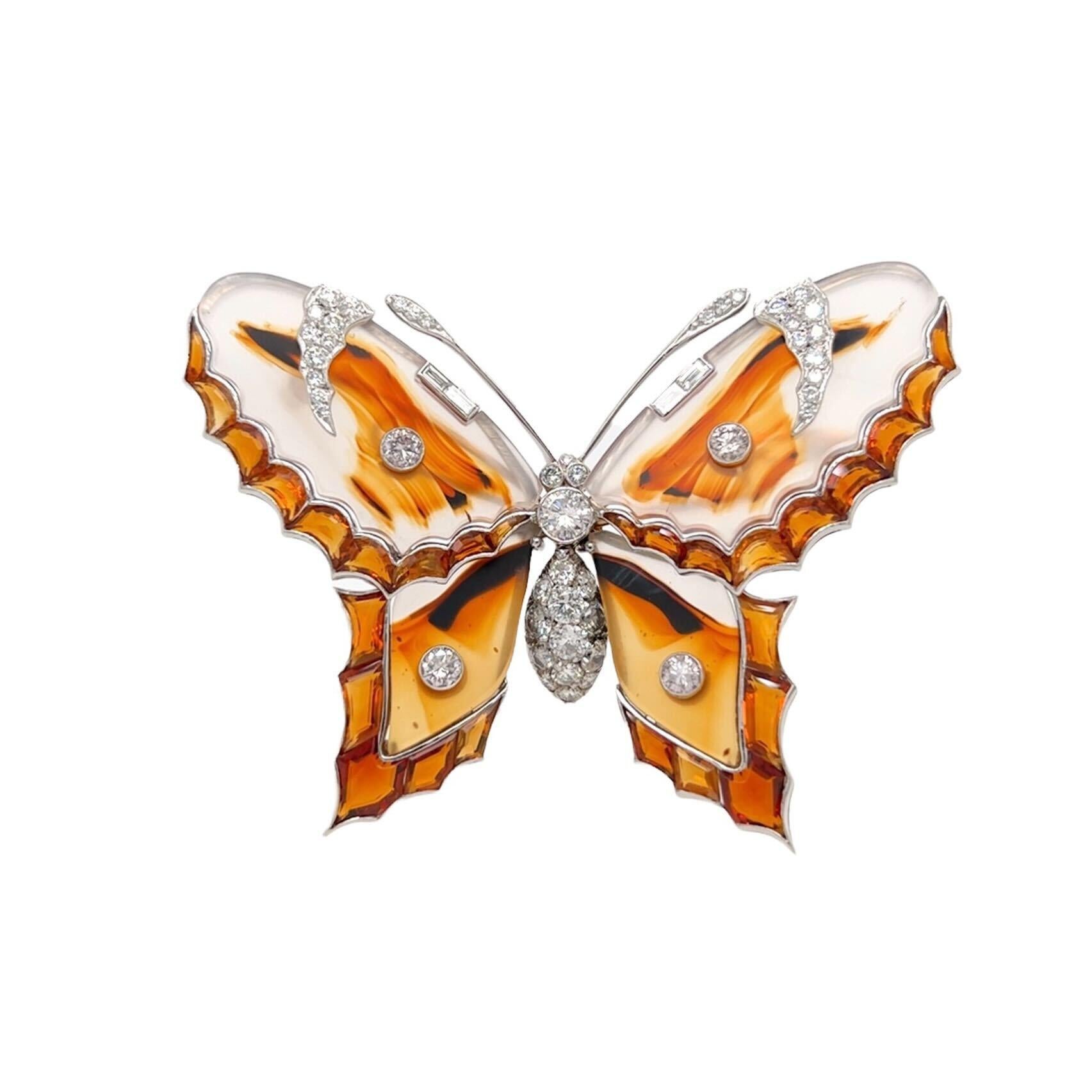 A Platinum, Gold, Agage, Citrine and Diamond Butterfly Brooch.