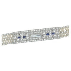 A Platinum, Natural Pearl, Sapphire and Diamond Bracelet 