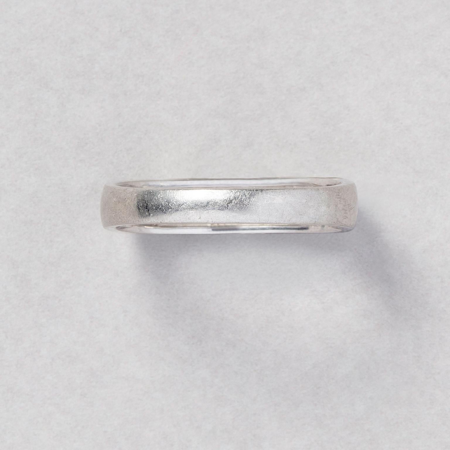A Platinum Ring with Five Square Cut Diamonds For Sale 1