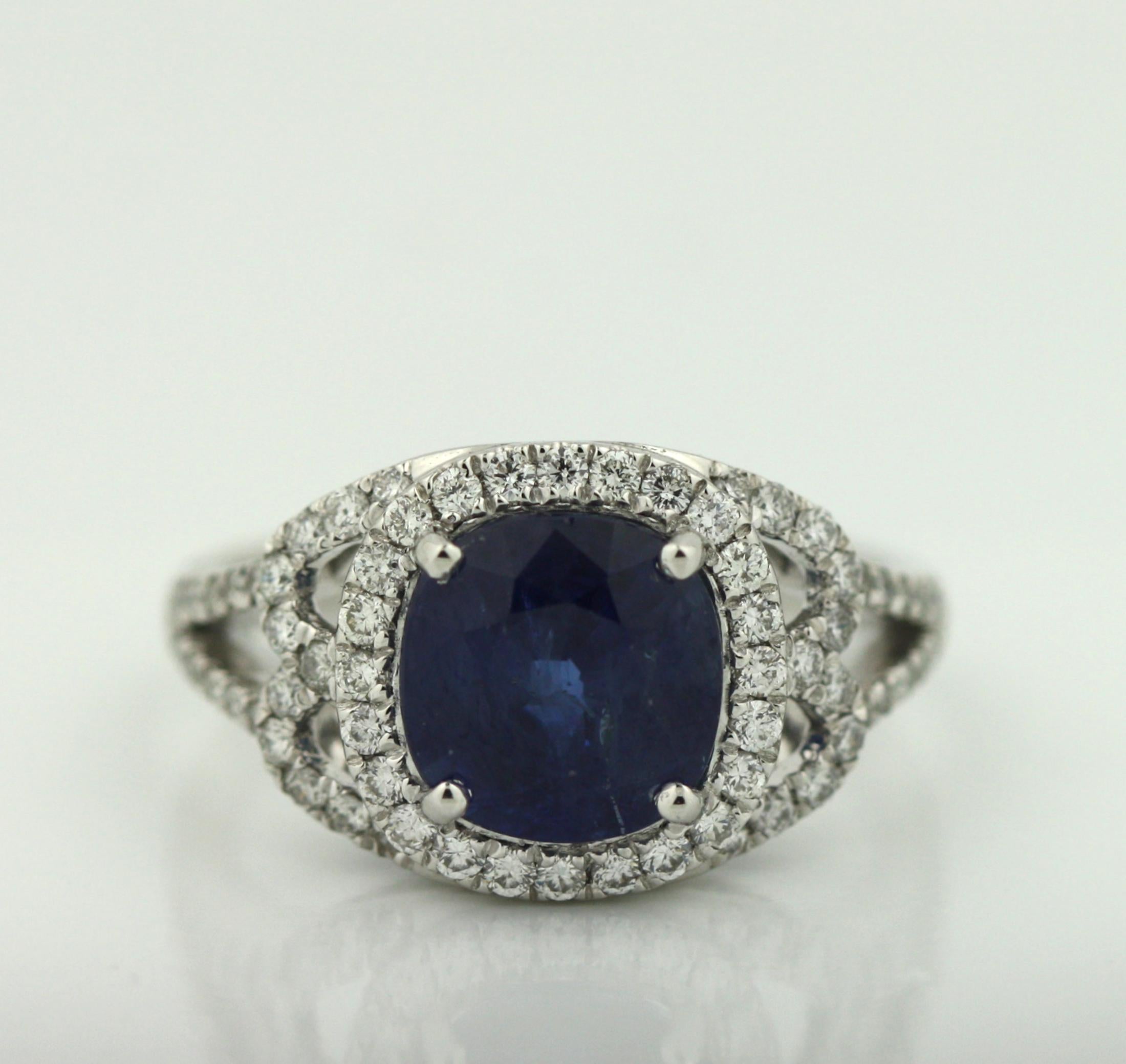 
A PLATINUM, SAPPHIRE, AND DIAMOND RING
Centering a 4.16-carat GIA-certified sapphire
The ring features a stunning, GIA-certified oval-cut sapphire weighing 4.16 carats, exhibiting a rich and velvety blue hue. The central stone is accented by 0.55