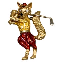 A playful and beautifully detailed vintage figural brooch depicting a fox mid-s