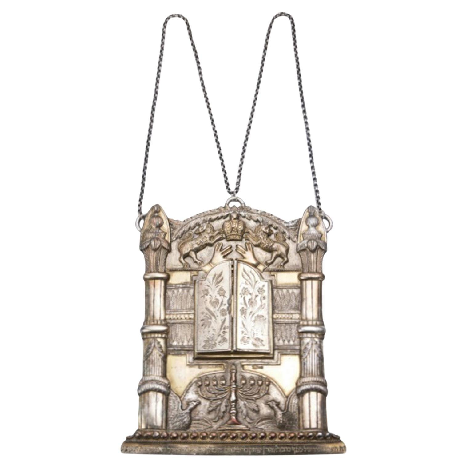 A Gorgeous Polish Silver Torah Shield, made by Pogorzelski in  Warsaw, 1890.

19th-century Poland was home to one of the largest populations of Jewish people living in Europe in that period.
Many artifacts especially significant ones like this Torah
