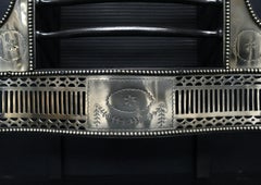 A Polished Brass Georgian Firegrate