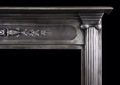 A Polished Cast Iron Fireplace in the Classical Style