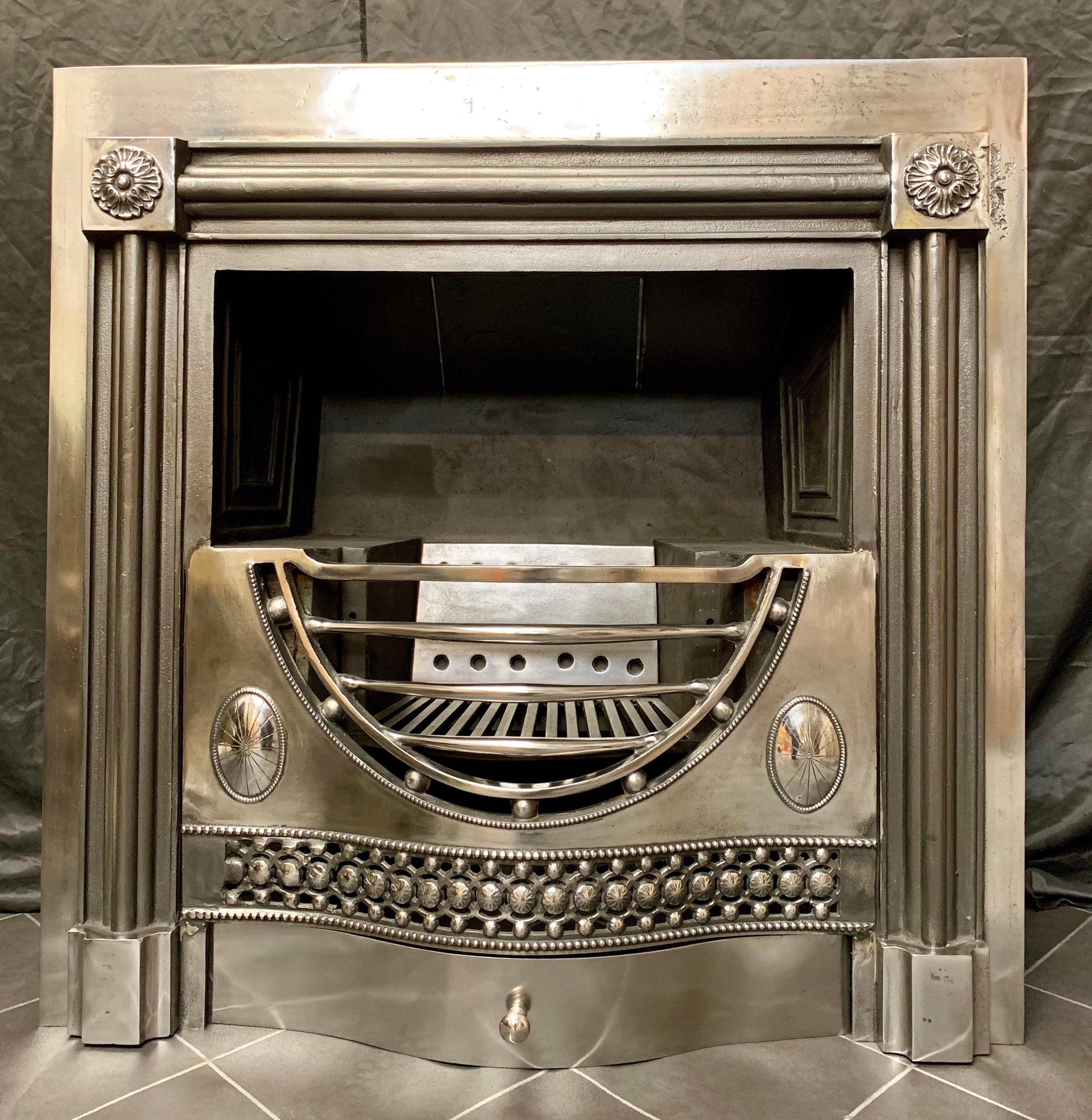 An important late Victorian Period -Georgian Style Polished Register Hob Grate Fireplace Insert of superb quality, in the manor of Robert Adam with integral 'ducks nest' hob grate and a four barred serpentine fire front, with seven cushion spacers.