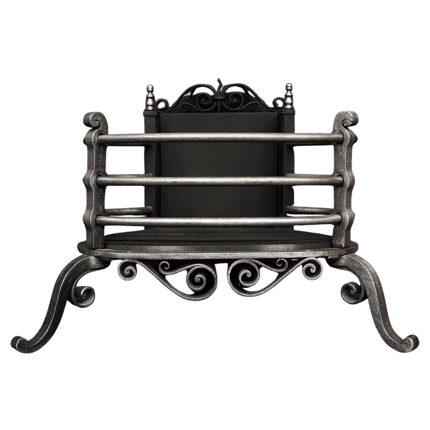 Une grille de cheminée Arts and Crafts