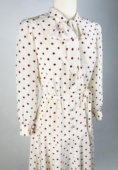 A Polka Dots crepe cocktail dress by Chanel Haute Couture numbered 59644 C. 1975