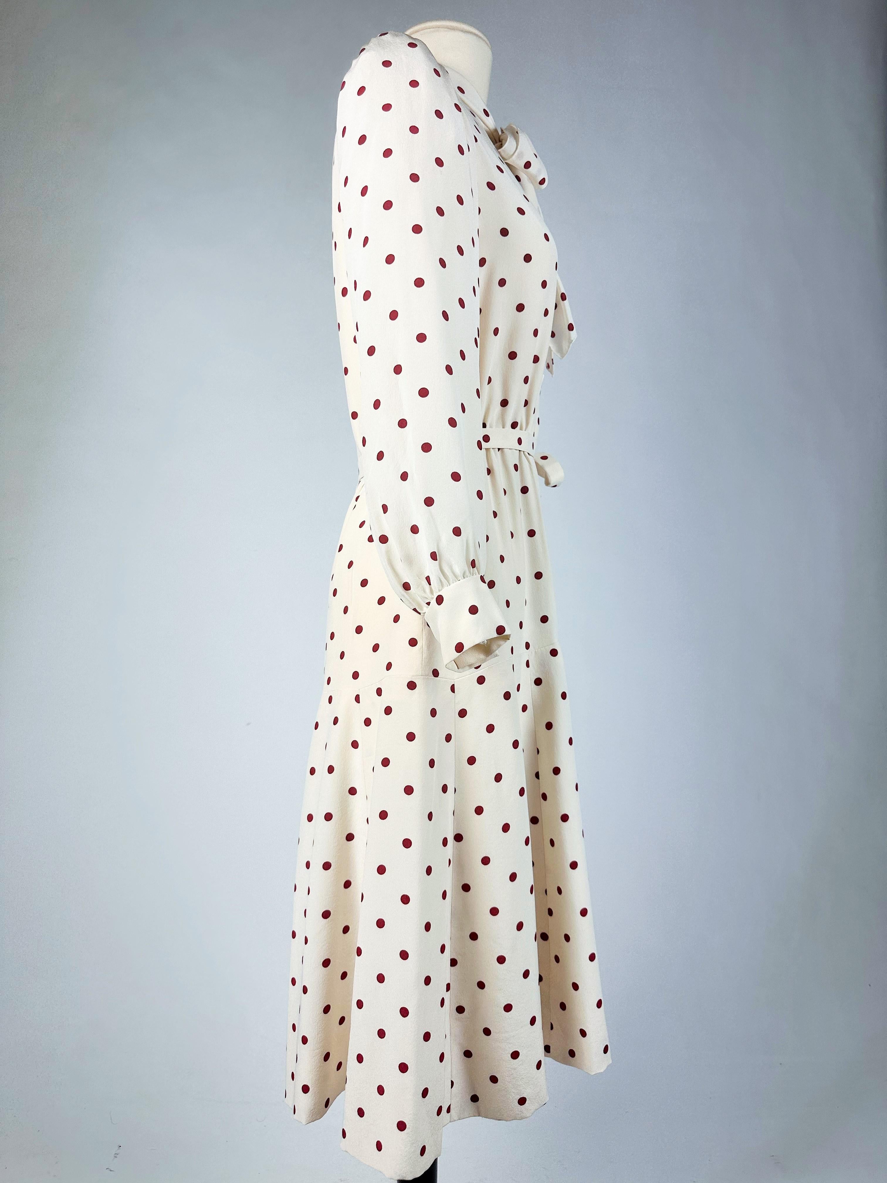 Women's A Polka Dots crepe cocktail dress by Chanel Haute Couture numbered 59644 C. 1975 For Sale