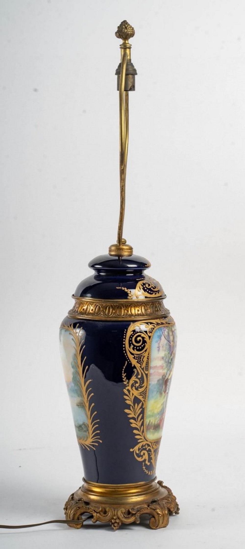 A Porcelain and Gilt Bronze Lamp Stand 1