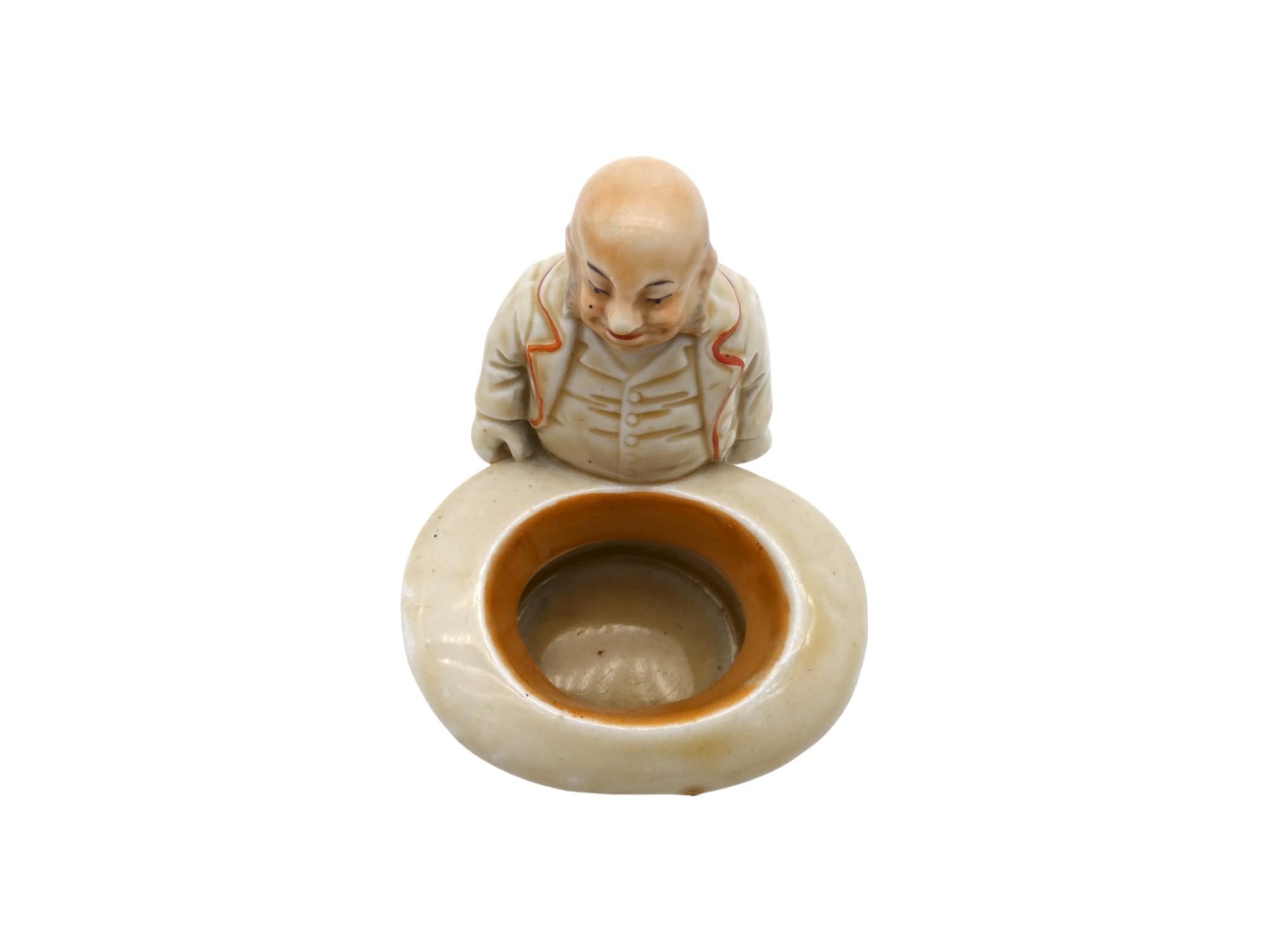 A Porcelain Jewish Banker Figurine, Europe early 20th century In Good Condition For Sale In New York, NY