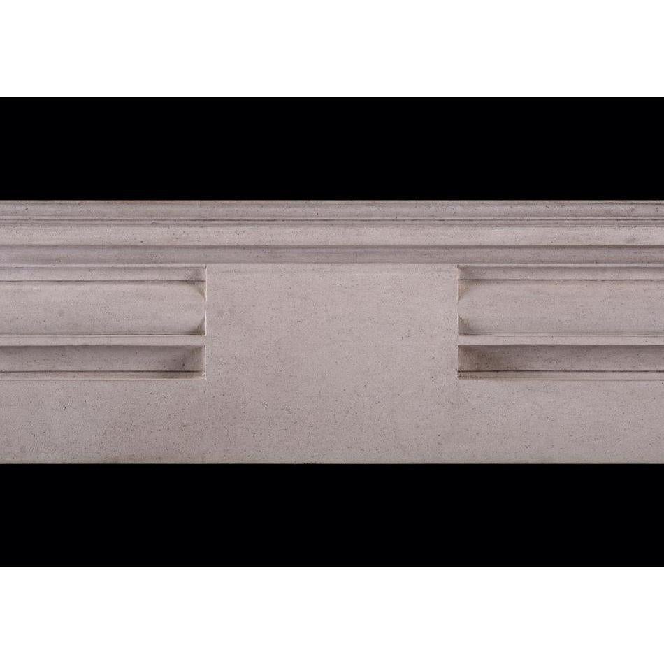 An English Portland stone fireplace in the manner of Edwin Lutyens. The moulded jambs surmounted by barrel frieze with plain centre. Moulded shelf above. One of a pair, with Stock No. 3783

Additional information:
Shelf Width: 1515 mm / 59