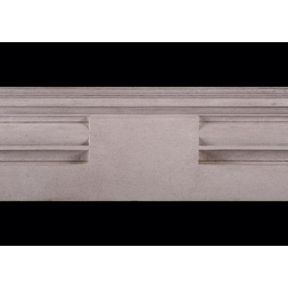 An English Portland stone fireplace in the manner of Edwin Lutyens. The moulded jambs surmounted by barrel frieze with plain centre. Moulded shelf above. One of a pair, with Stock No. 3783

Additional information:
Shelf Width: 1515 mm / 59