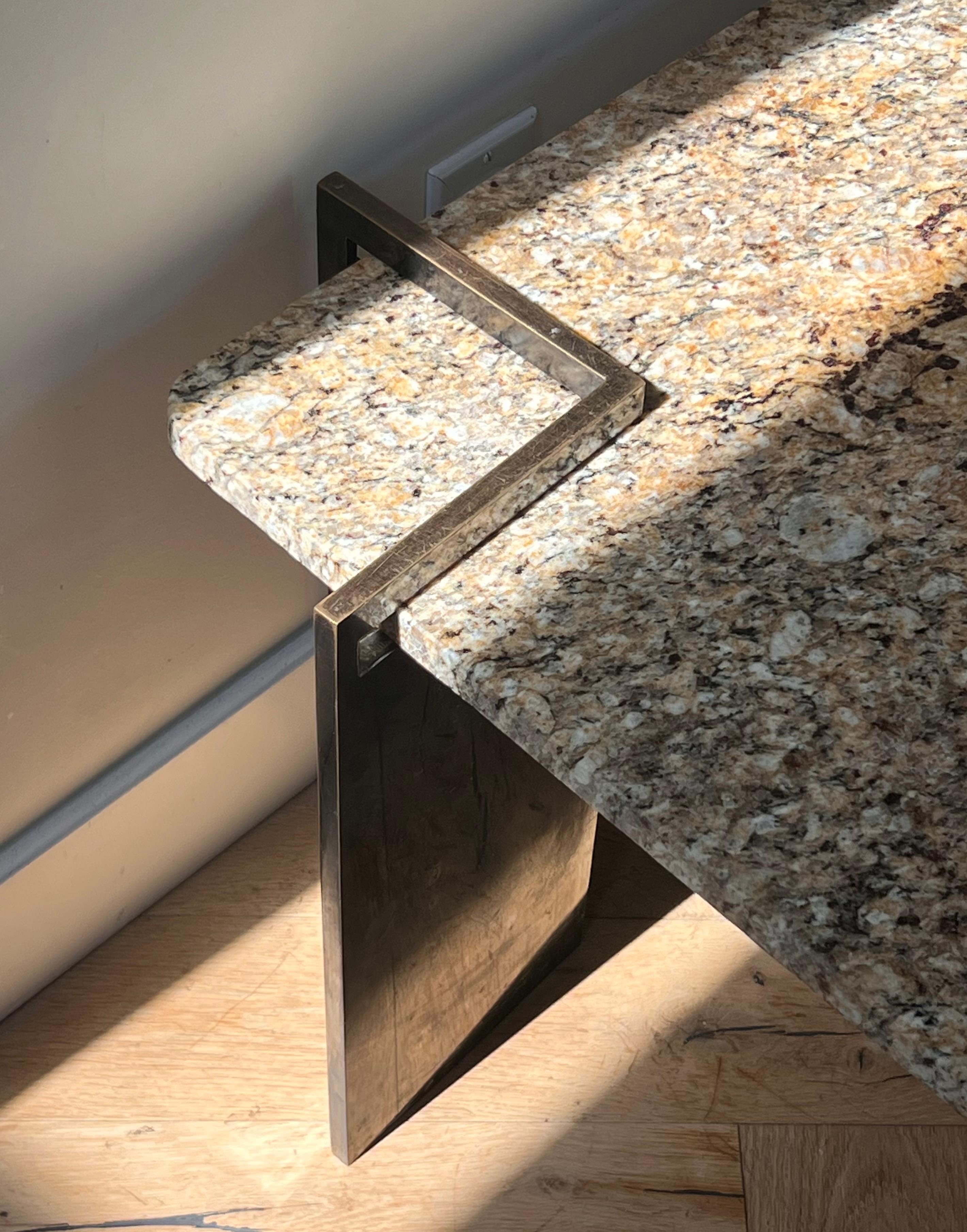 A postmodern granite and steel coffee table, 1970s 9
