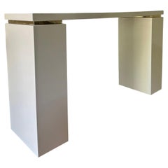 A postmodern lacquered console table with gold detail, late 20th century