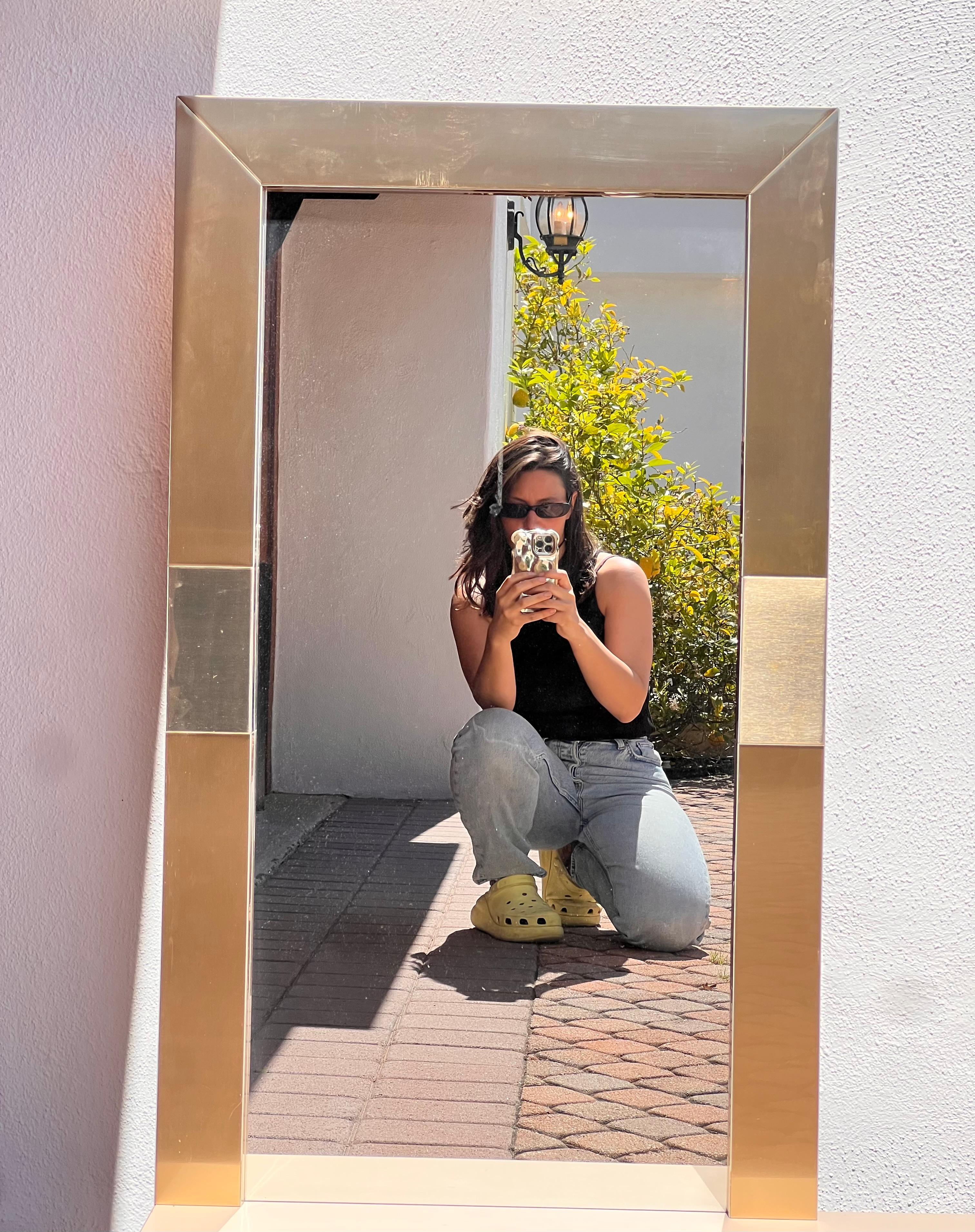 A postmodern Paul Evans style metallic mirror with shelf, late 20th century For Sale 4