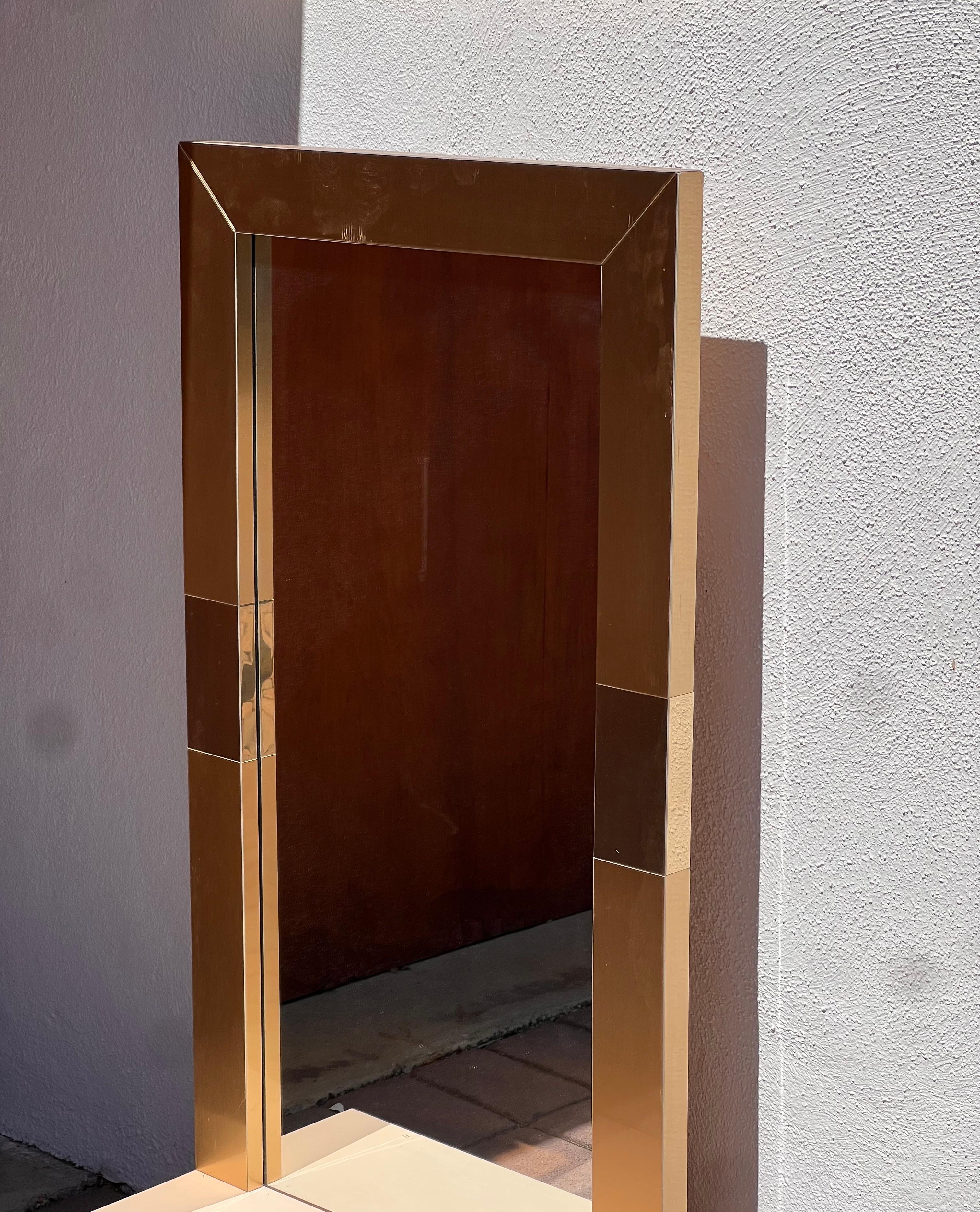 A postmodern Paul Evans style metallic mirror with shelf, late 20th century For Sale 7