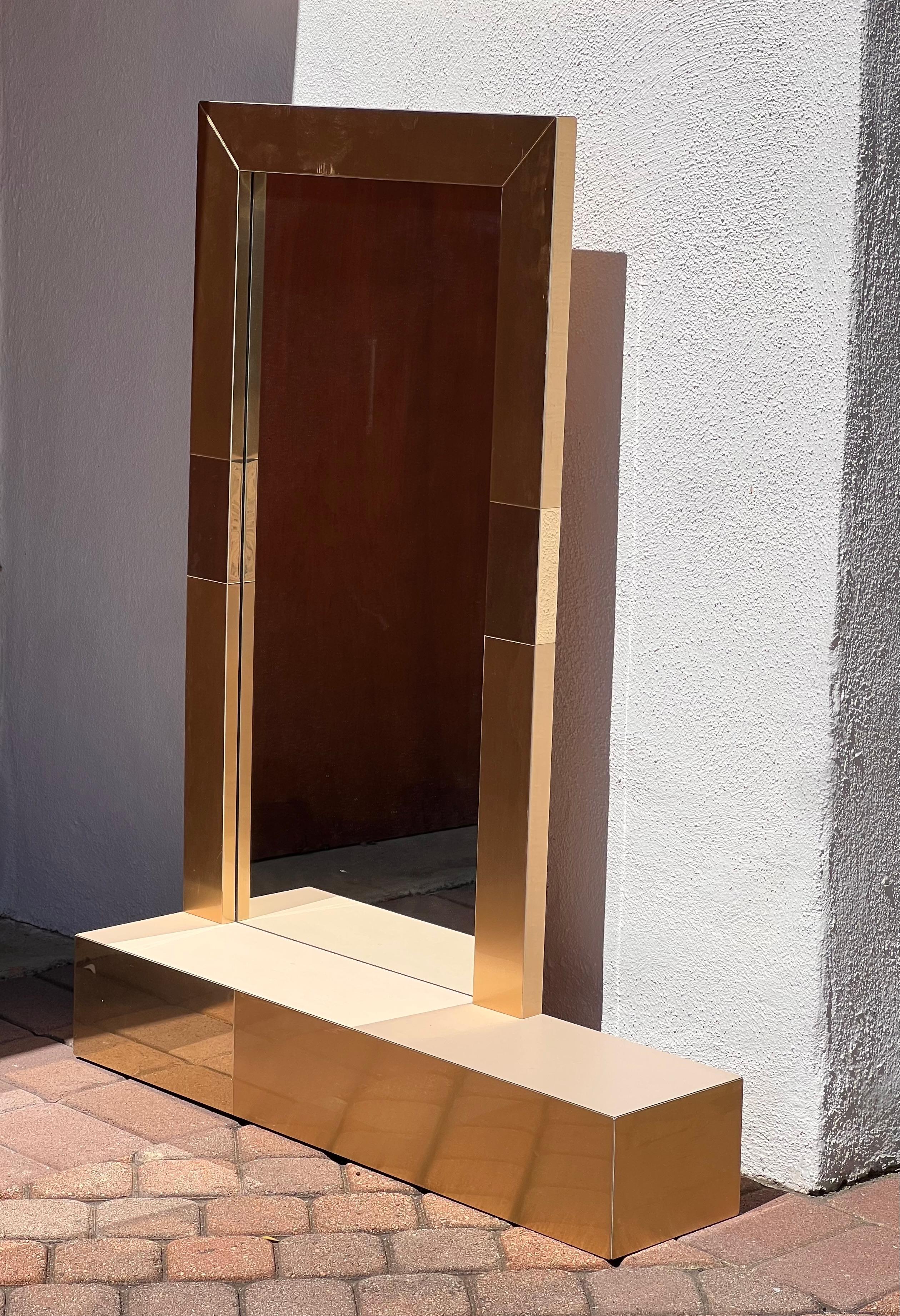 A postmodern Paul Evans style metallic mirror with shelf, late 20th century For Sale 9