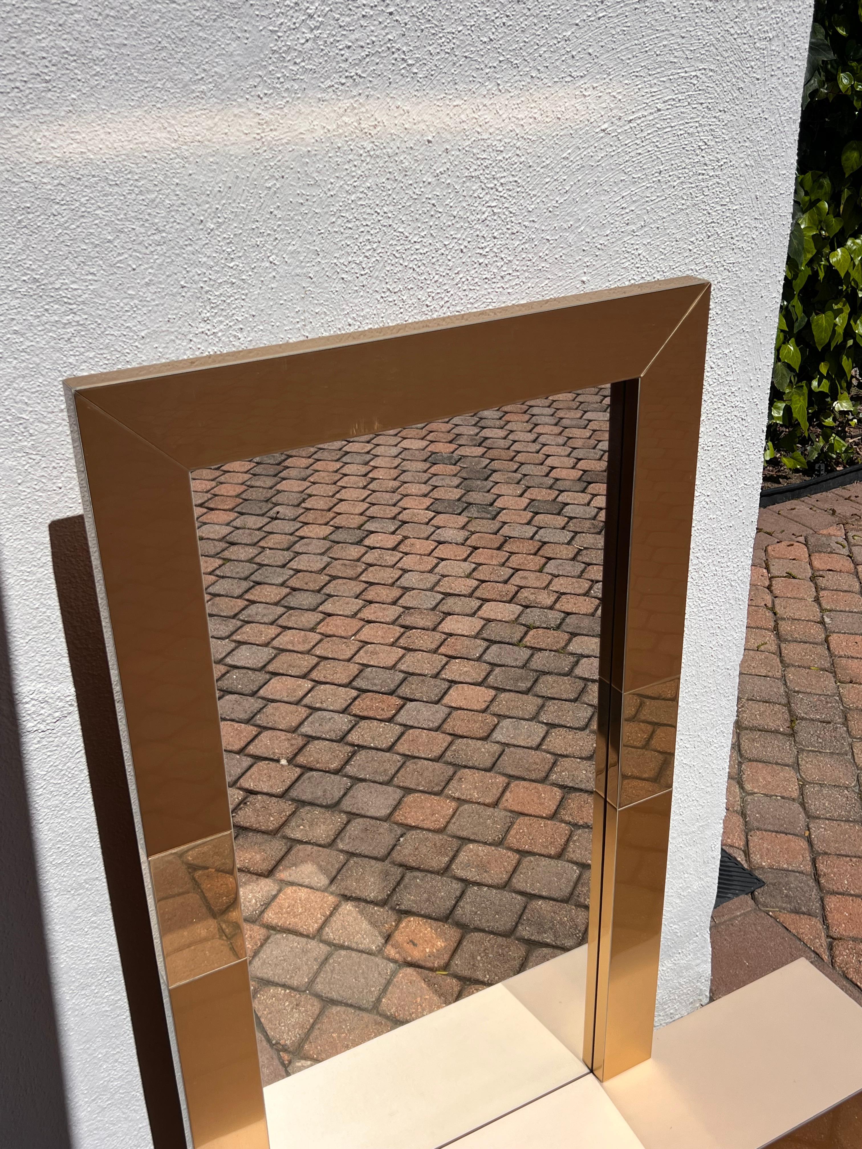 A postmodern Paul Evans style metallic mirror with shelf, late 20th century For Sale 10