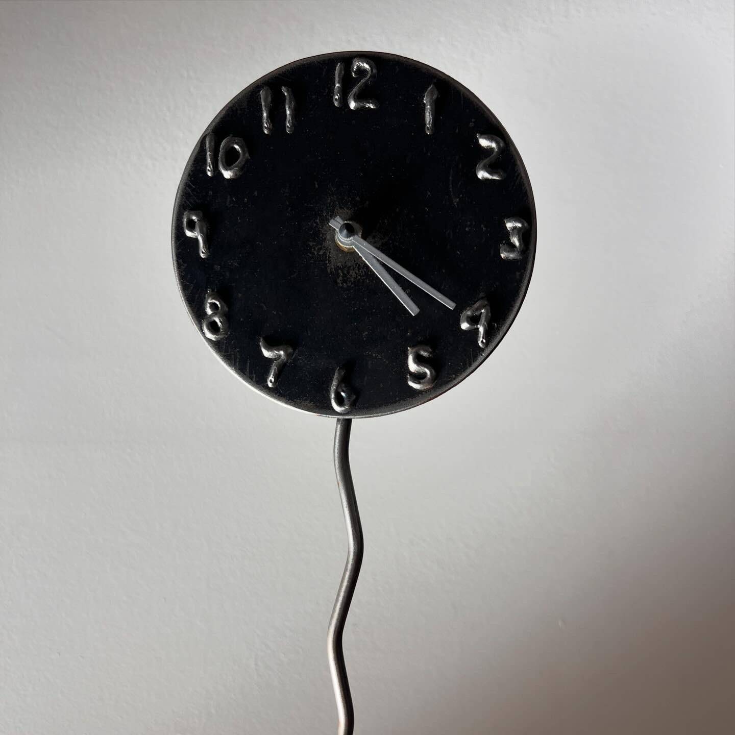  « Postmodern Form and Reform », a hand-forged metal sculpture clock with long squiggle base by Jon Sarriugarte, signed, 1991. With battery operated mechanism on verso. Works like a dream. Pick up in central west Los Angeles or we ship worldwide.