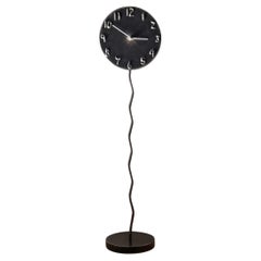Vintage A postmodern sculptural welded metal clock by Jon Sarriugarte, signed, 1991