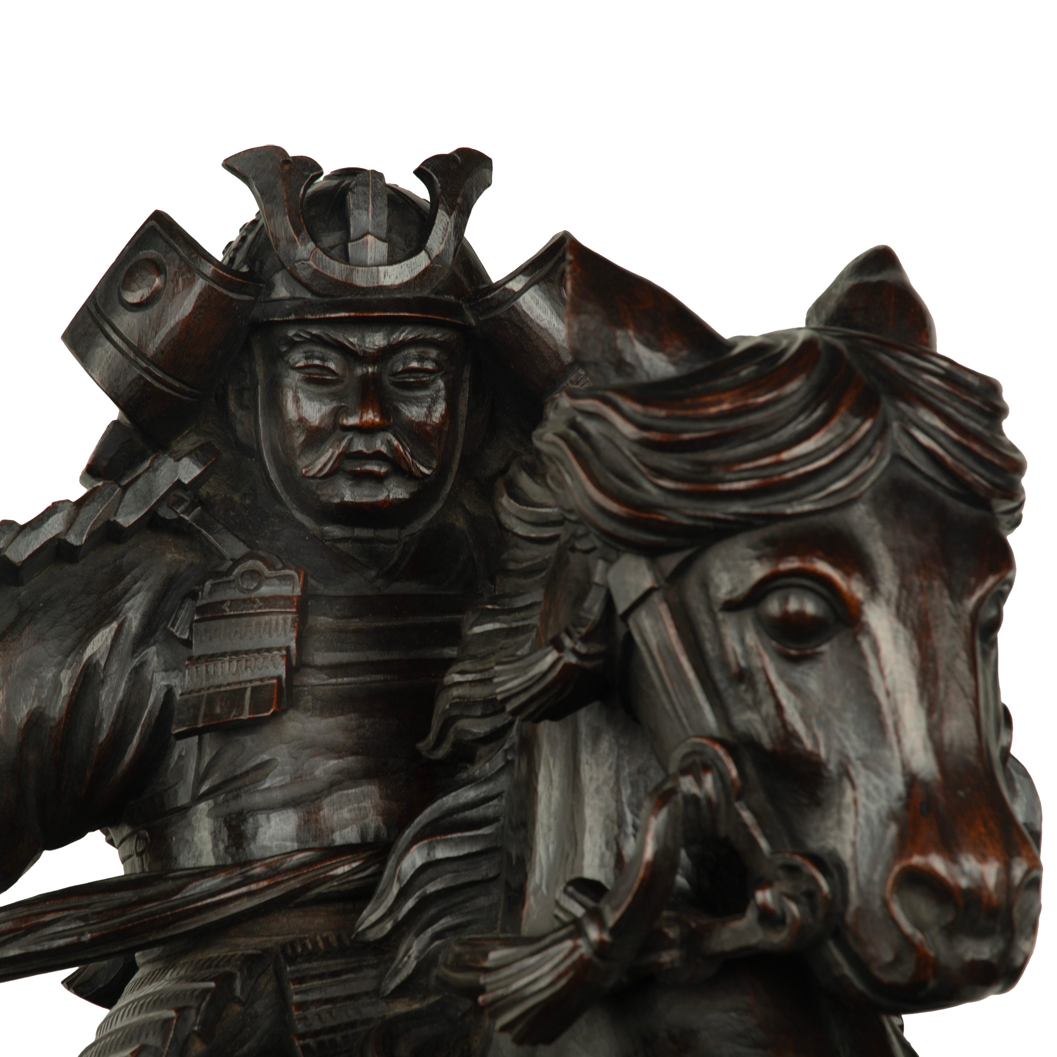 A powerful Japanese equestrian wood carving of a samurai by Yoshida Issen/Isshun For Sale 1