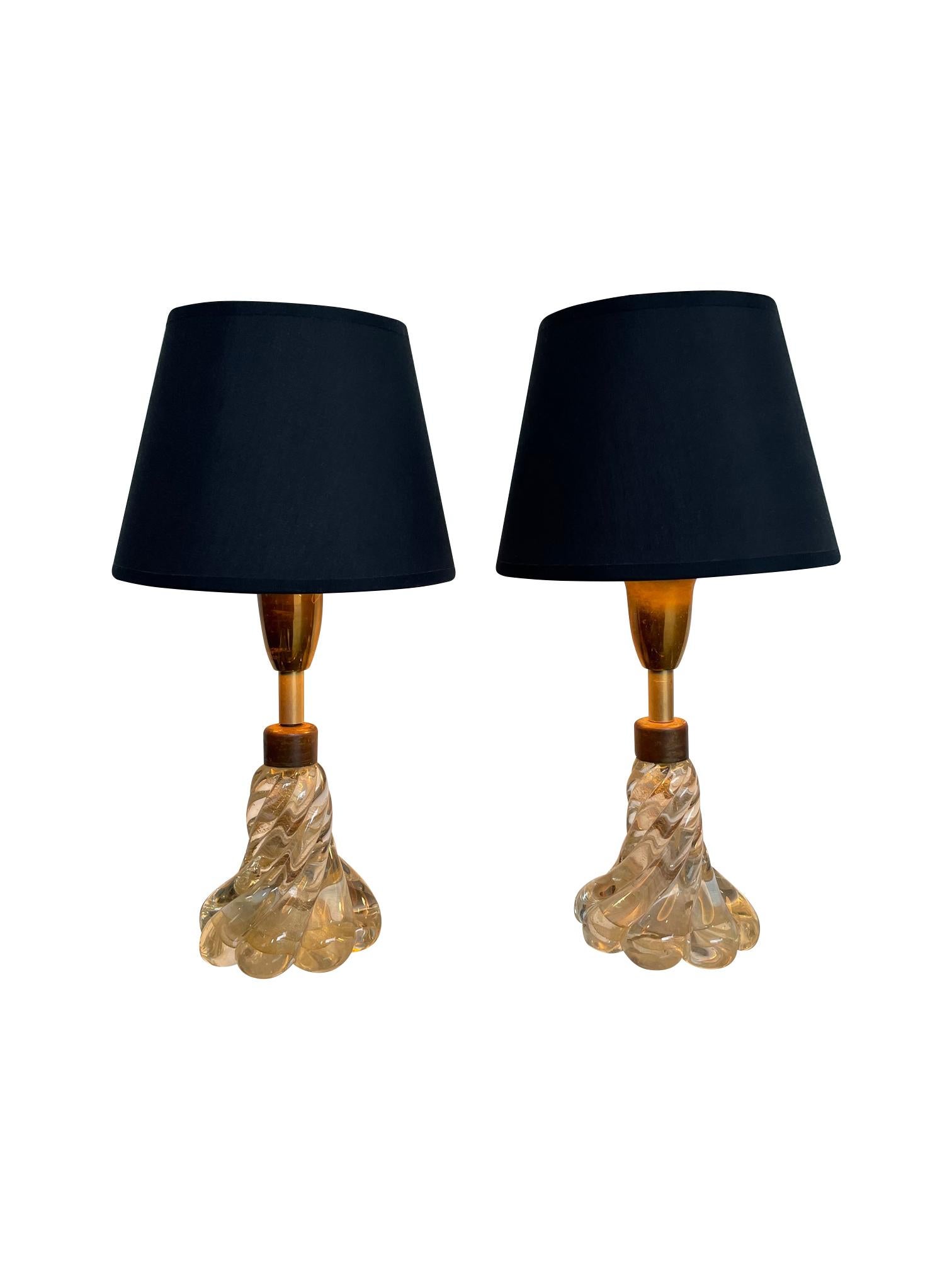 A pretty pair of 1950s Barovier & Toso lamps with Avventurina Murano twisted glass base with gold flecks in. Mounted with scolloped brass top and fitting, re-wired with antique gold cord flex and PAT tested with new bespoke black shades with gold