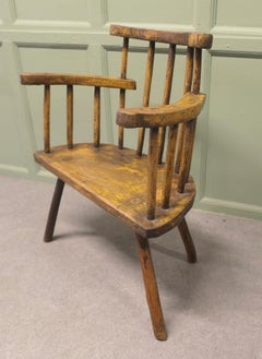 A Primitive 18th century Country Comb Back Armchair