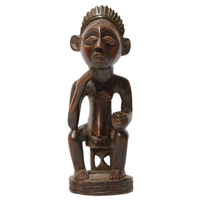 Primitive Angola Stammesfigur aus geschnitztem Hartholz, um 1930 im Angebot