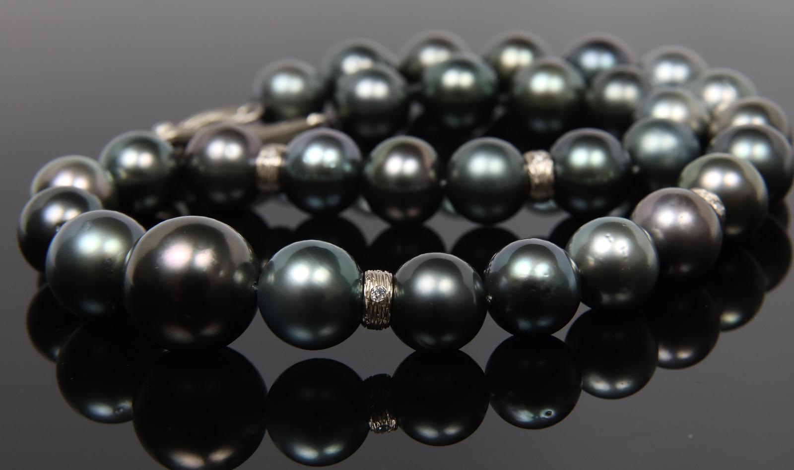 A gray Tahitian pearl, diamond, and white gold necklace is powerful enough to say 