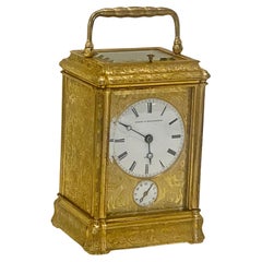 Profusely Engraved to All Sides Gilt Bronze Carriage Clock, circa 1860