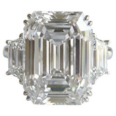 A Promise in Platinum: 9.13ct G/VS1 Emerald Cut Embraced by Trapezoids