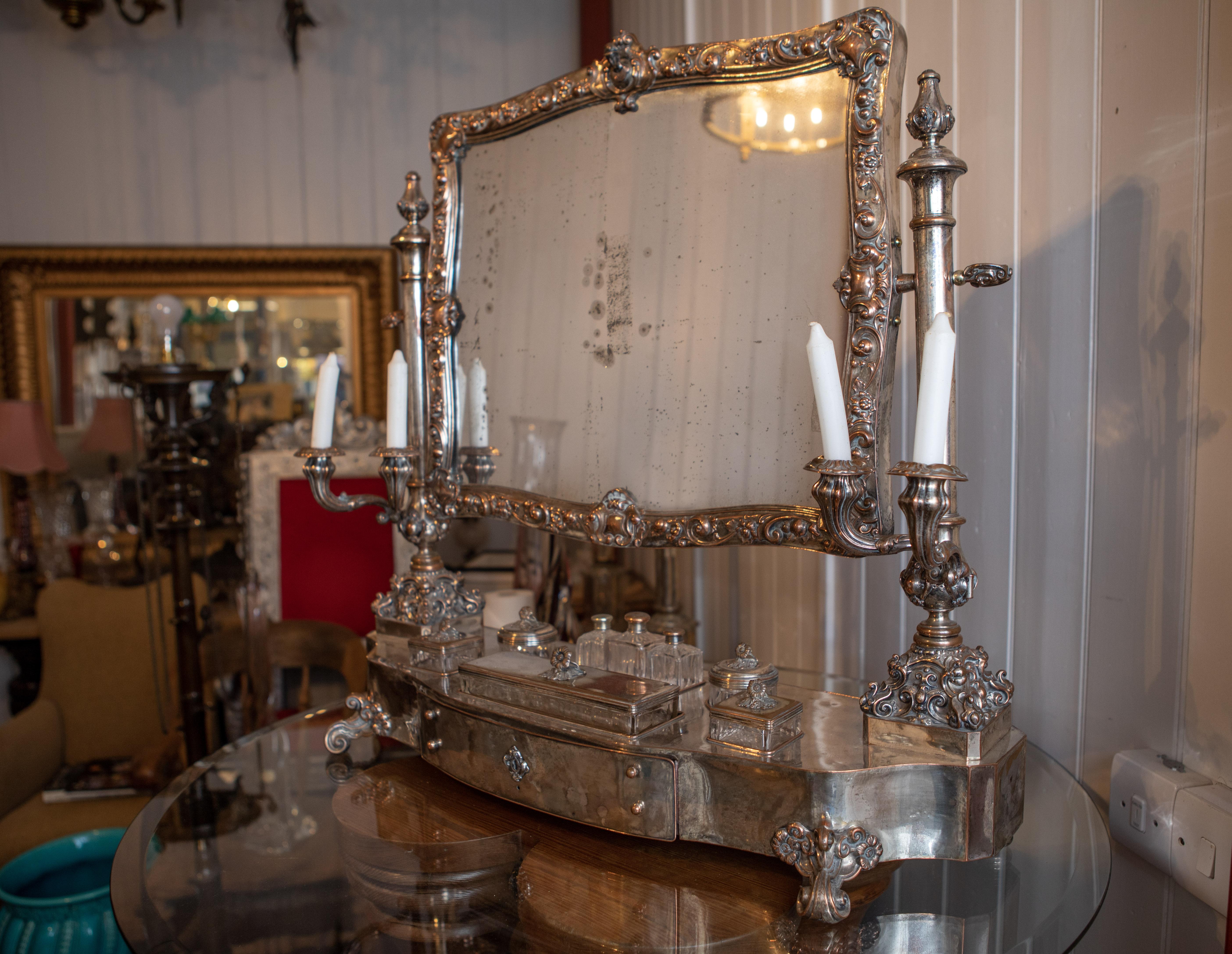 A satin birch wood and silver-plated on copper (Sheffield plate style) adjustable dressing table mirror and candelabra on stand with a single draw on scroll feet complete with; a silver-plated tray, seven glass, and silver-plated original trinket