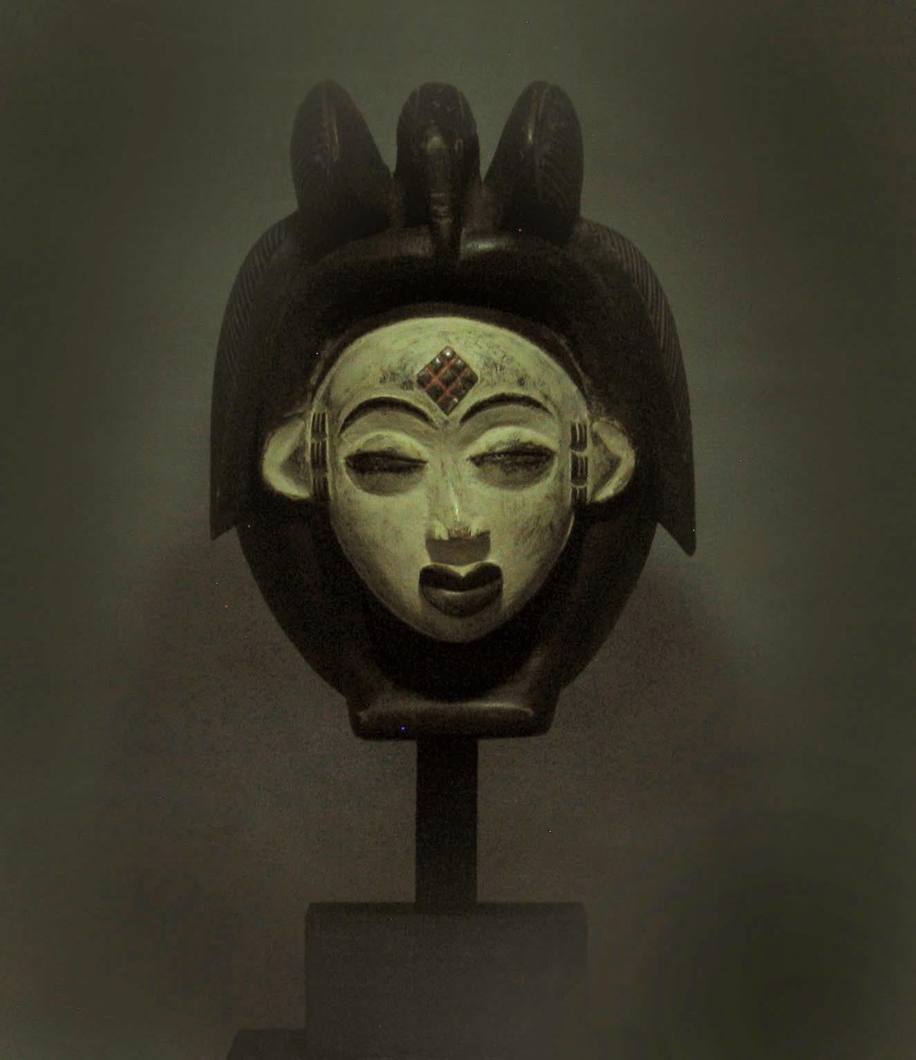 Punu Mask Gabon 20th Century with Decorative African Statue 20th Century 3