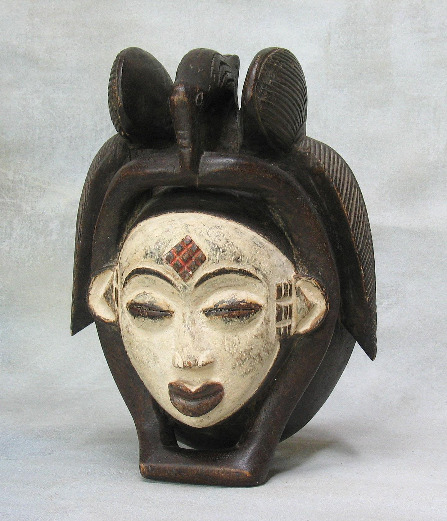Wood Punu Mask Gabon 20th Century with Decorative African Statue 20th Century