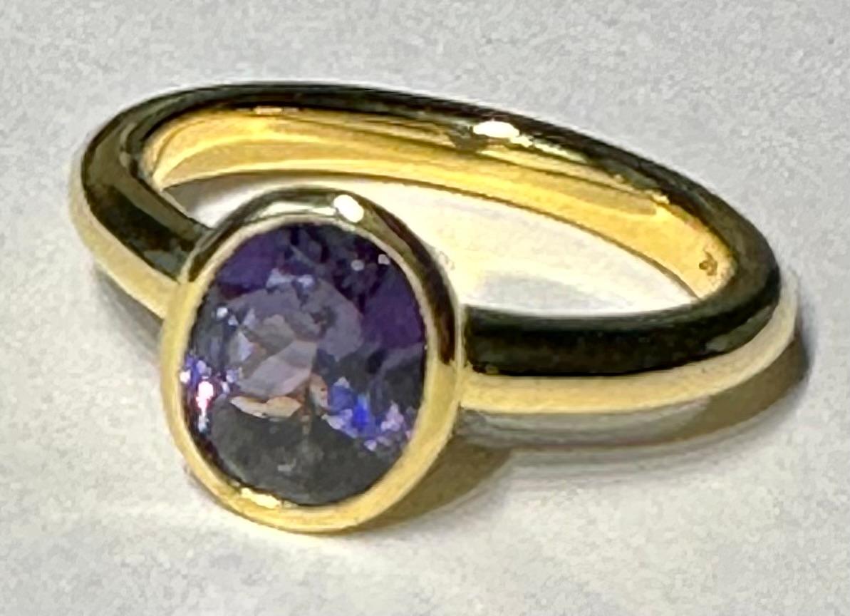 A Kary Adam Designed Purple Spinel Ring Set in 14 Karat Yellow Gold For Sale 5