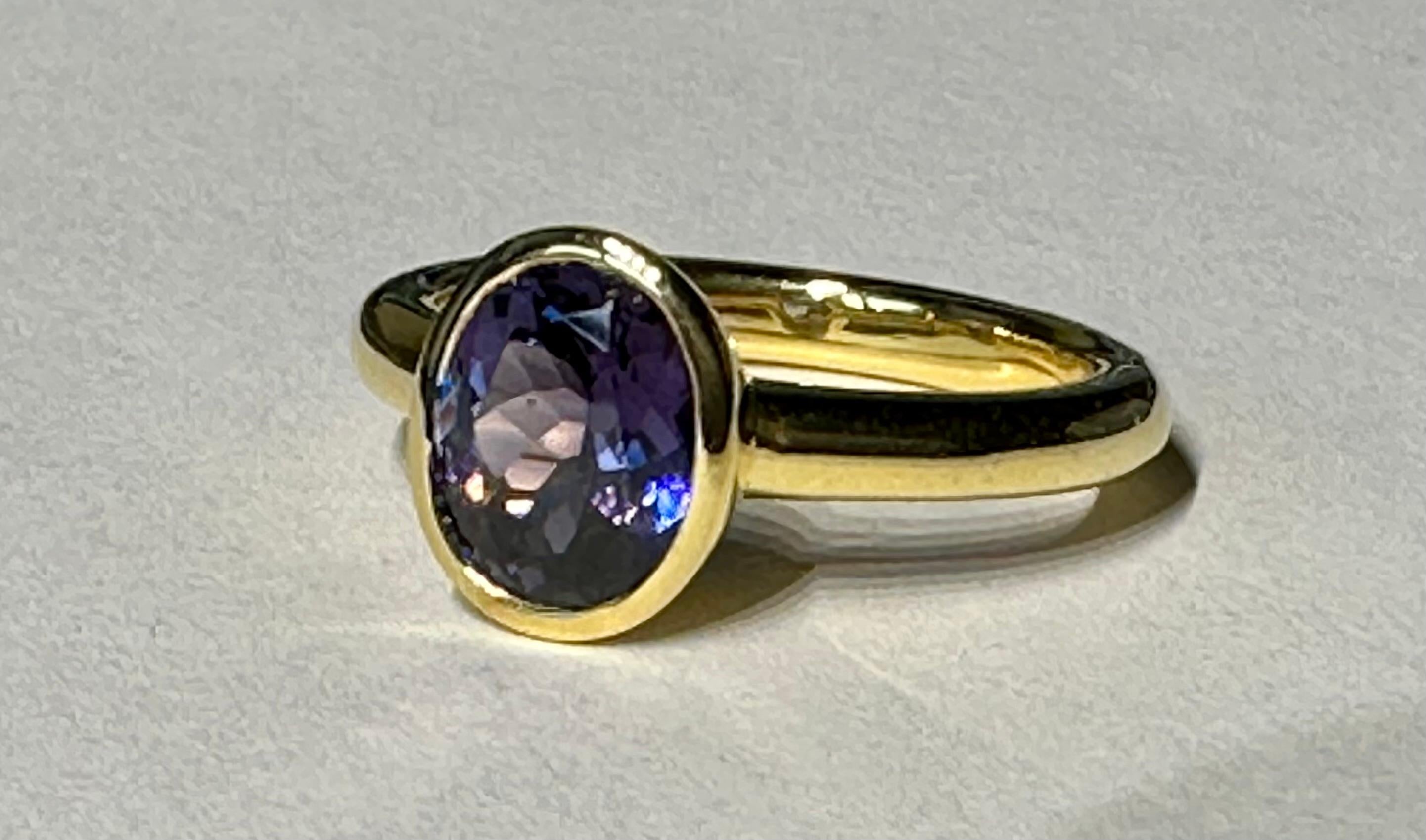 A Kary Adam Designed Purple Spinel Ring Set in 14 Karat Yellow Gold For Sale 6