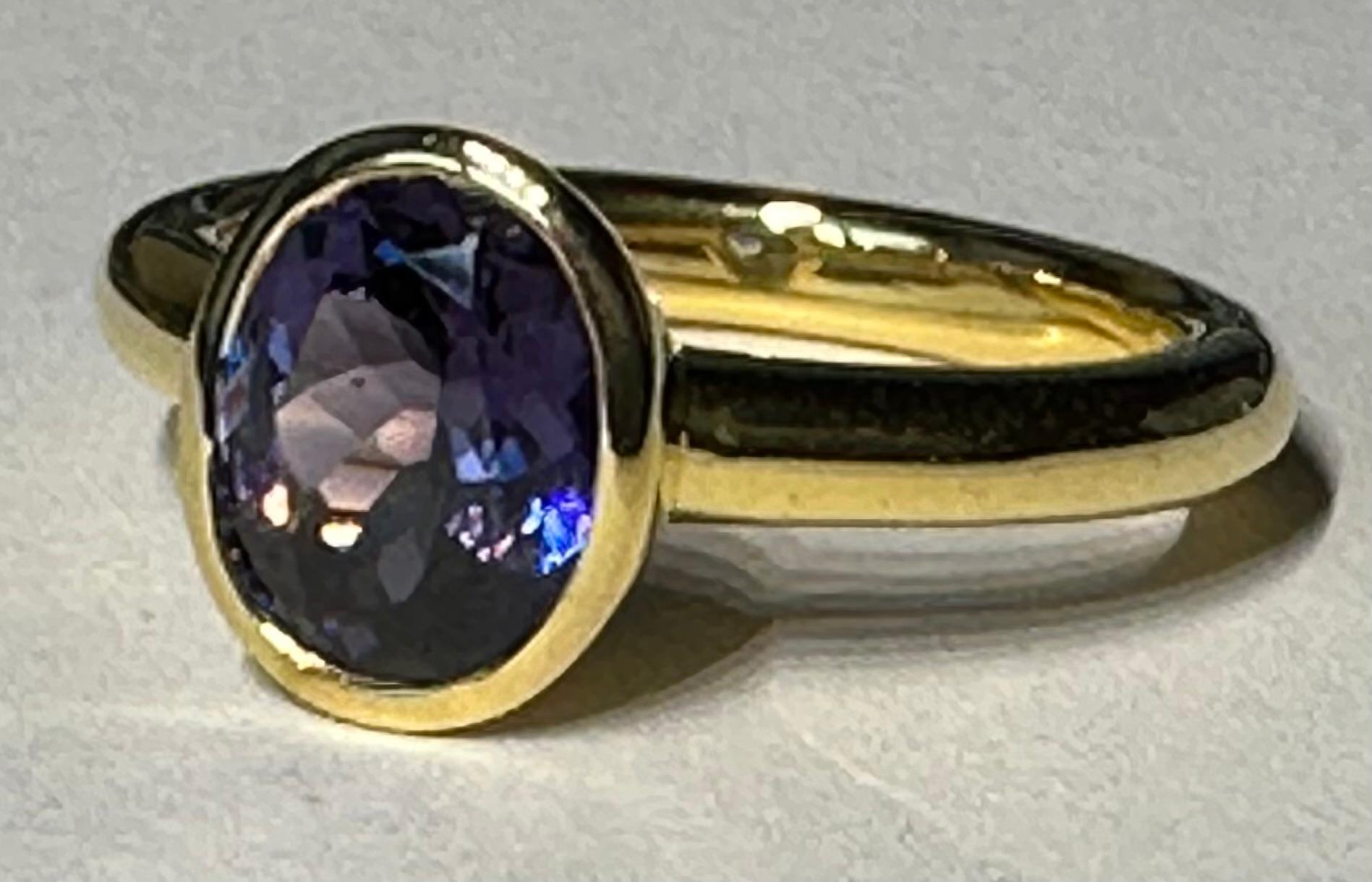 A Kary Adam Designed Purple Spinel Ring Set in 14 Karat Yellow Gold For Sale 7