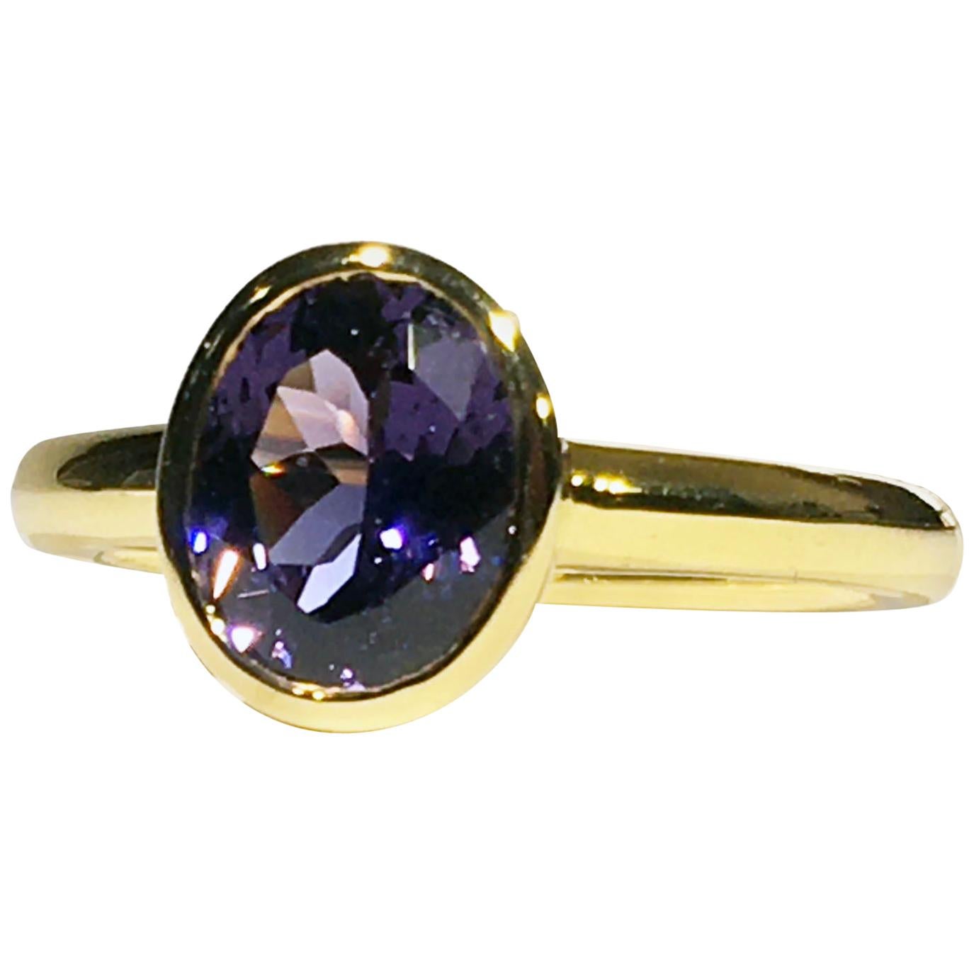 A Kary Adam Designed Purple Spinel Ring Set in 14 Karat Yellow Gold For Sale