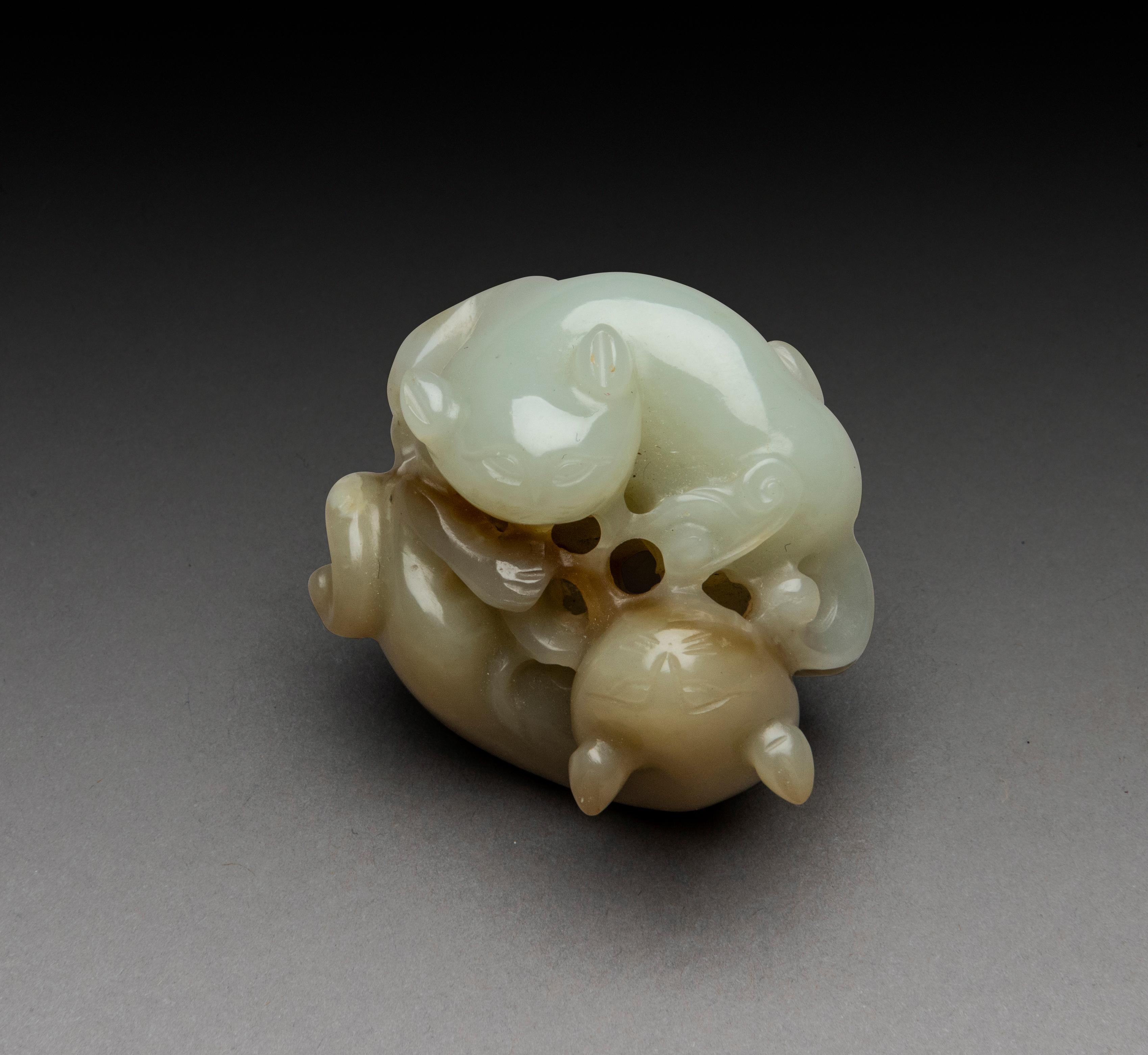 A Qing Dynasty Pale Celadon Jade and Creamy Jade Carving of Two Cats ...