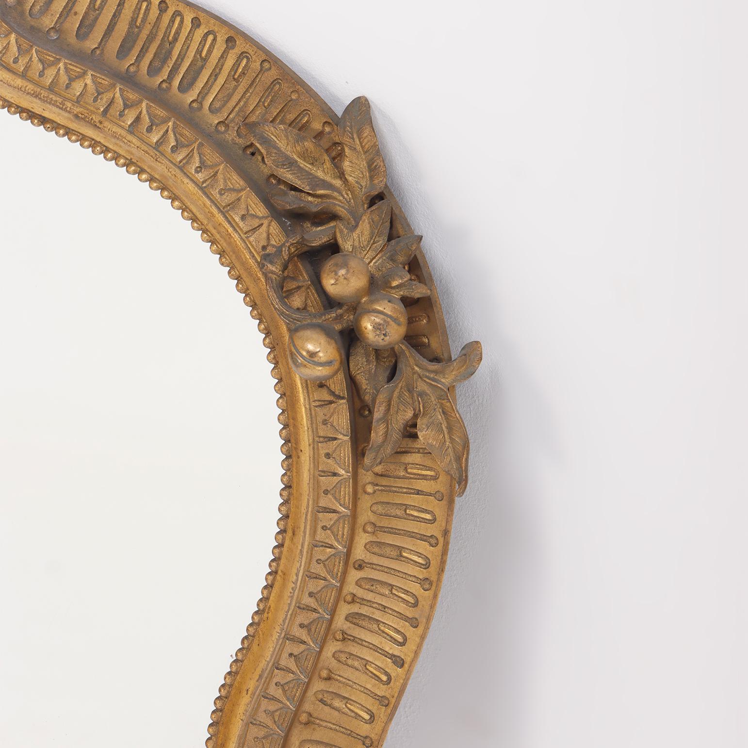 Early 20th Century A quality cast bronze French wall mirror with nicely detailed border circa 1900.