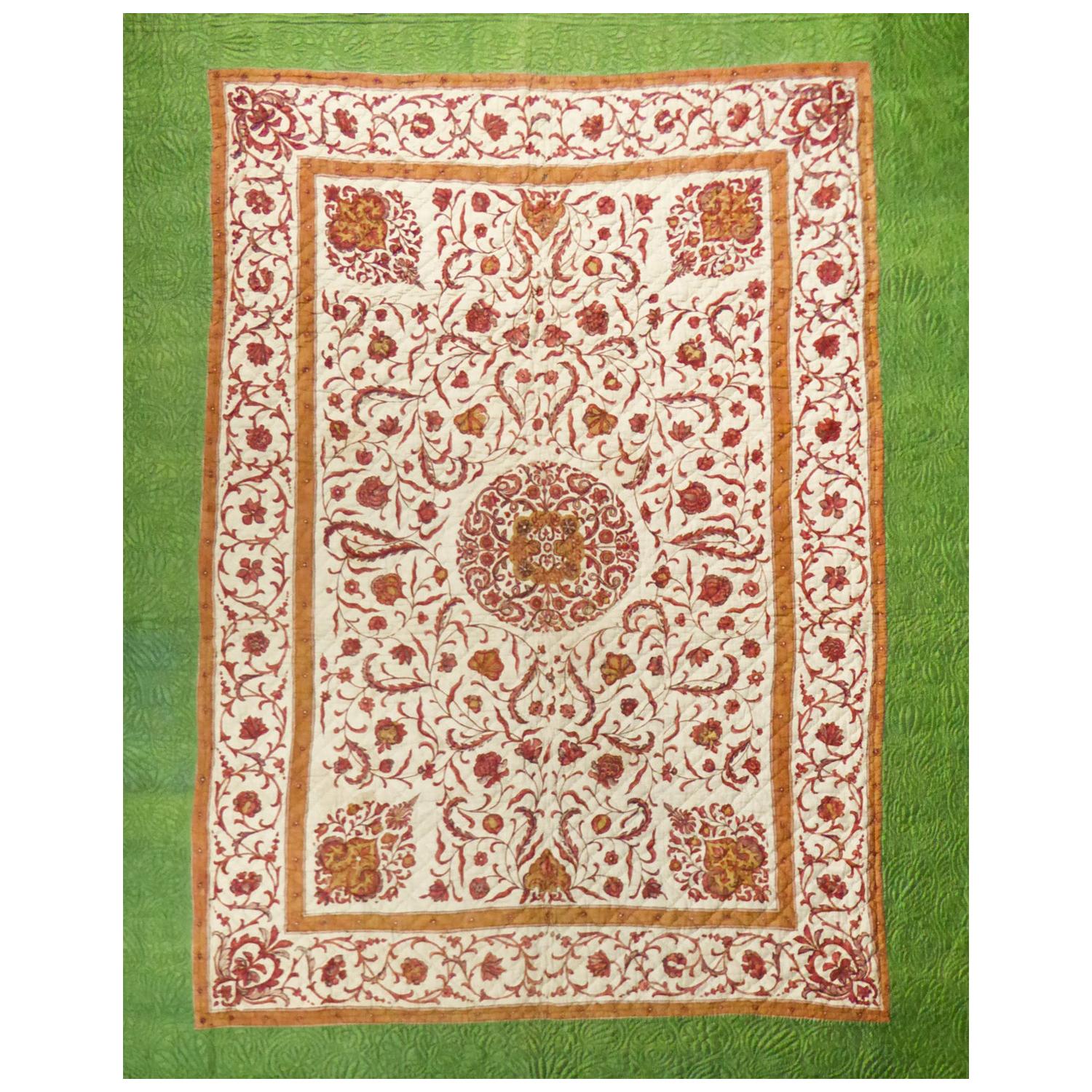 A Quilting Indian Chintz Palampore And Taffeta Bedcover Circa 1720/1750