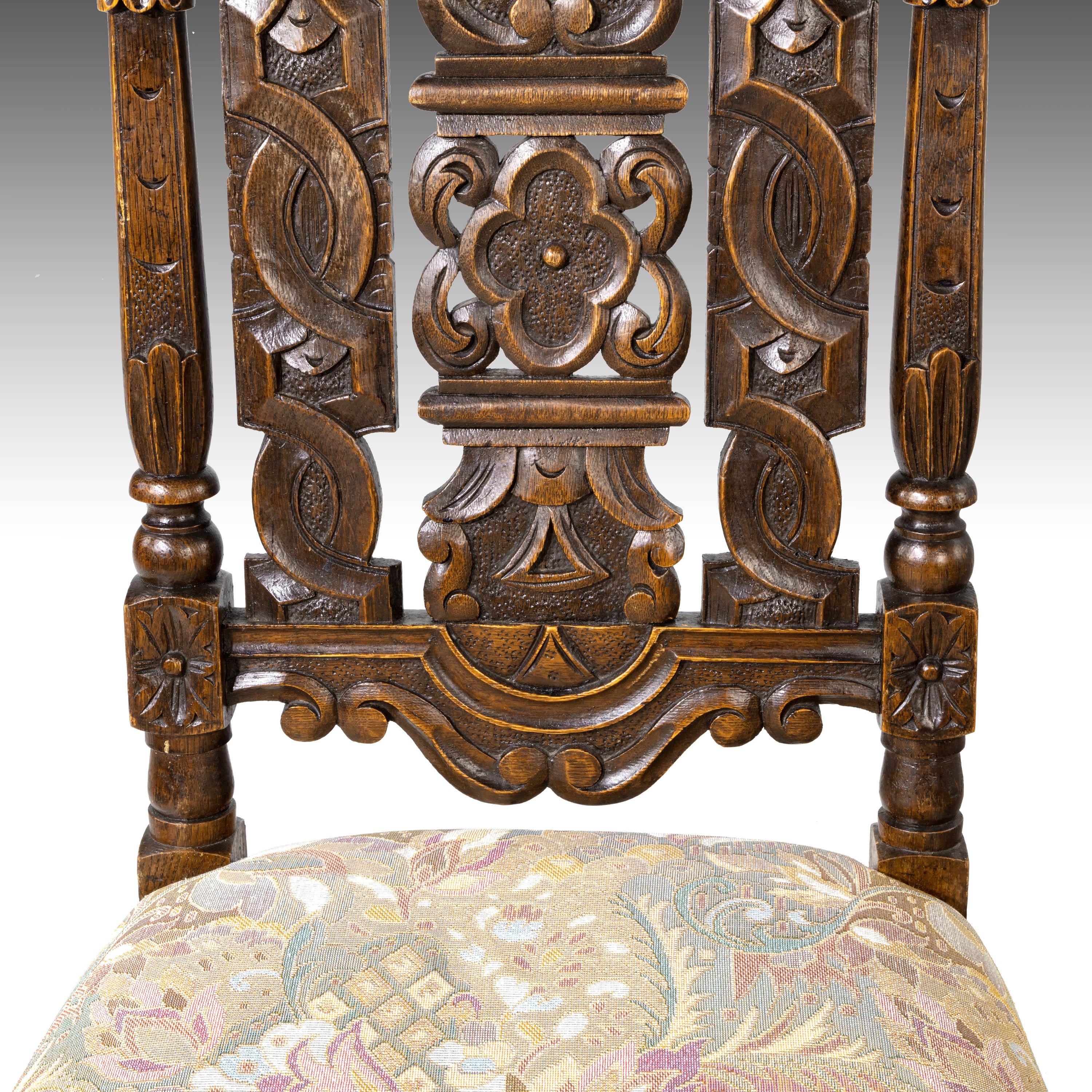 A quite exceptional set of 6 (4+2) 17th century style oak chairs. The backs very finely carved with elaborate scrollwork, foliage and indentations. Heavily pierced and in quite extraordinary condition. Obviously from a first-class workshop. The