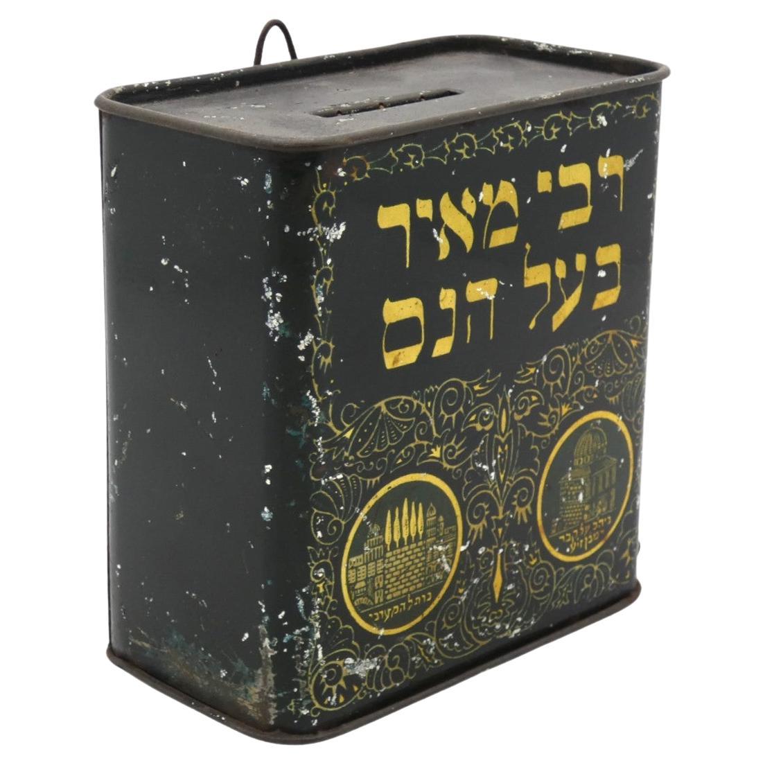A Rabbi Meir Ba'al Haness charity container from Israel circa 1920 is an artifact associated with Jewish religious devotion and charitable traditions.

Rabbi Meir Ba'al Haness, also known as Rabbi Meir the Miracle Worker, was a renowned Jewish sage