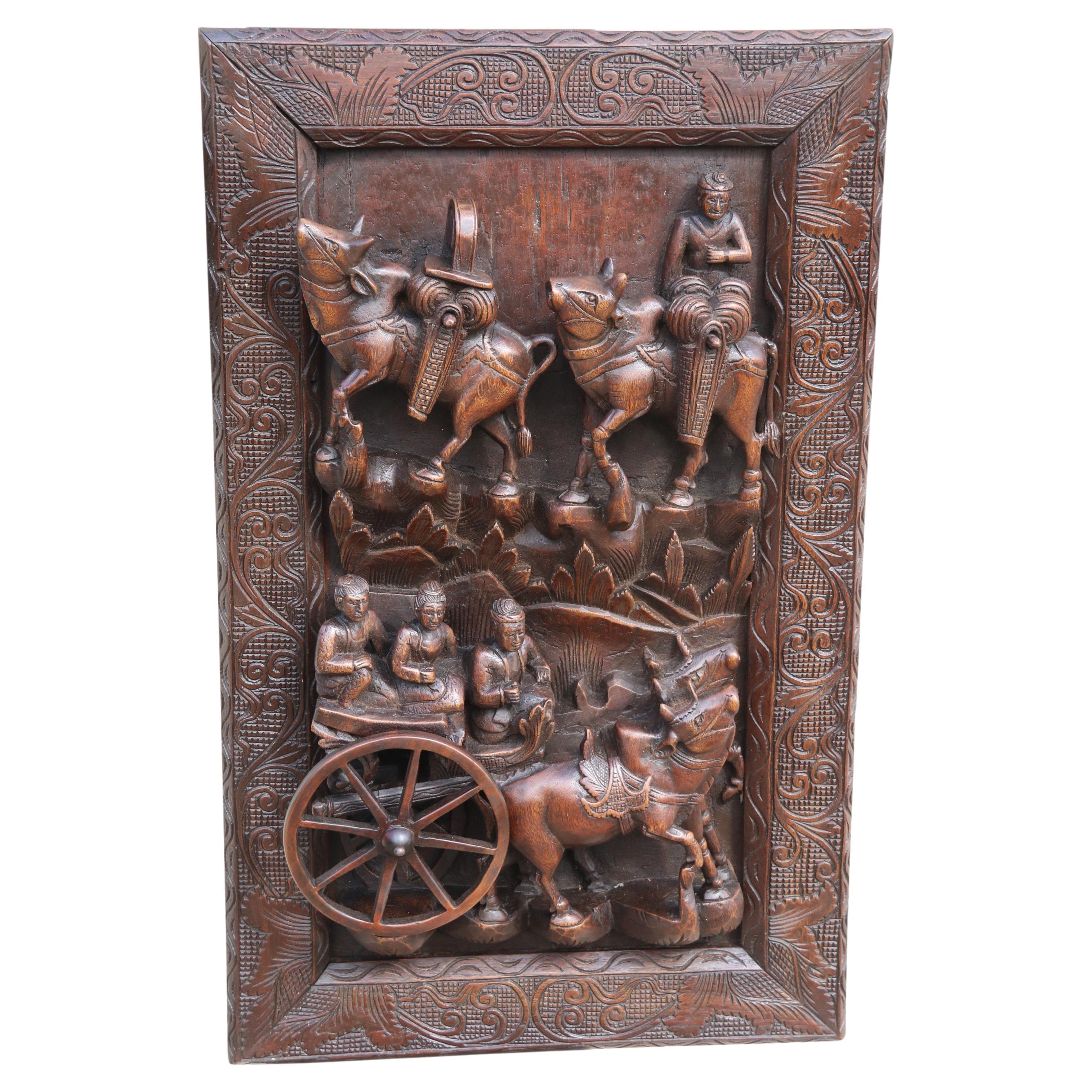 A Raj period Indian carved and framed deep relief hardwood wall panel circa 1880 For Sale