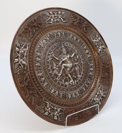 A Raj period silver, copper and brass repousse work charger, Indian circa 1900