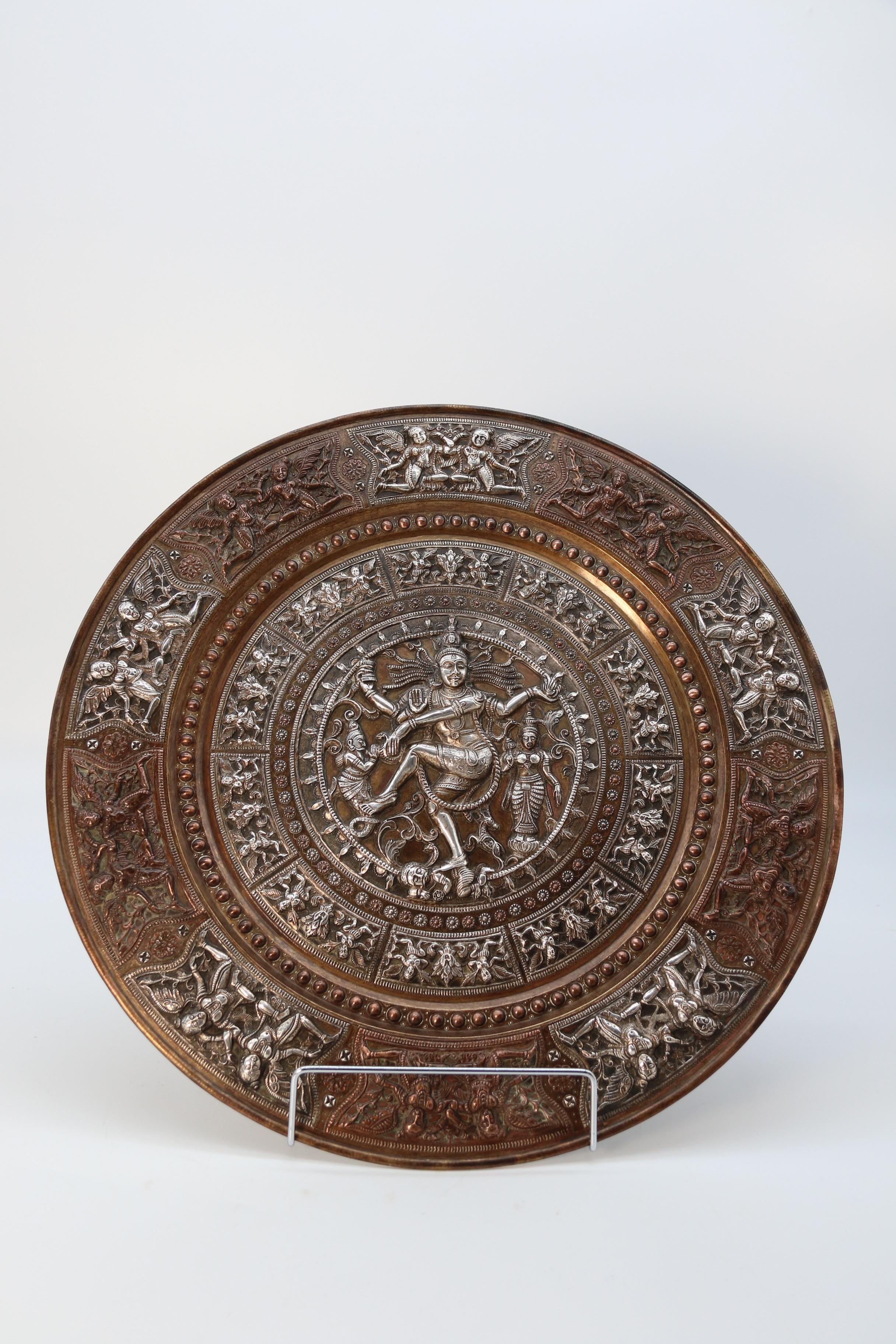Repoussé A Raj period silver, copper and brass repousse work charger, Indian circa 1900 For Sale