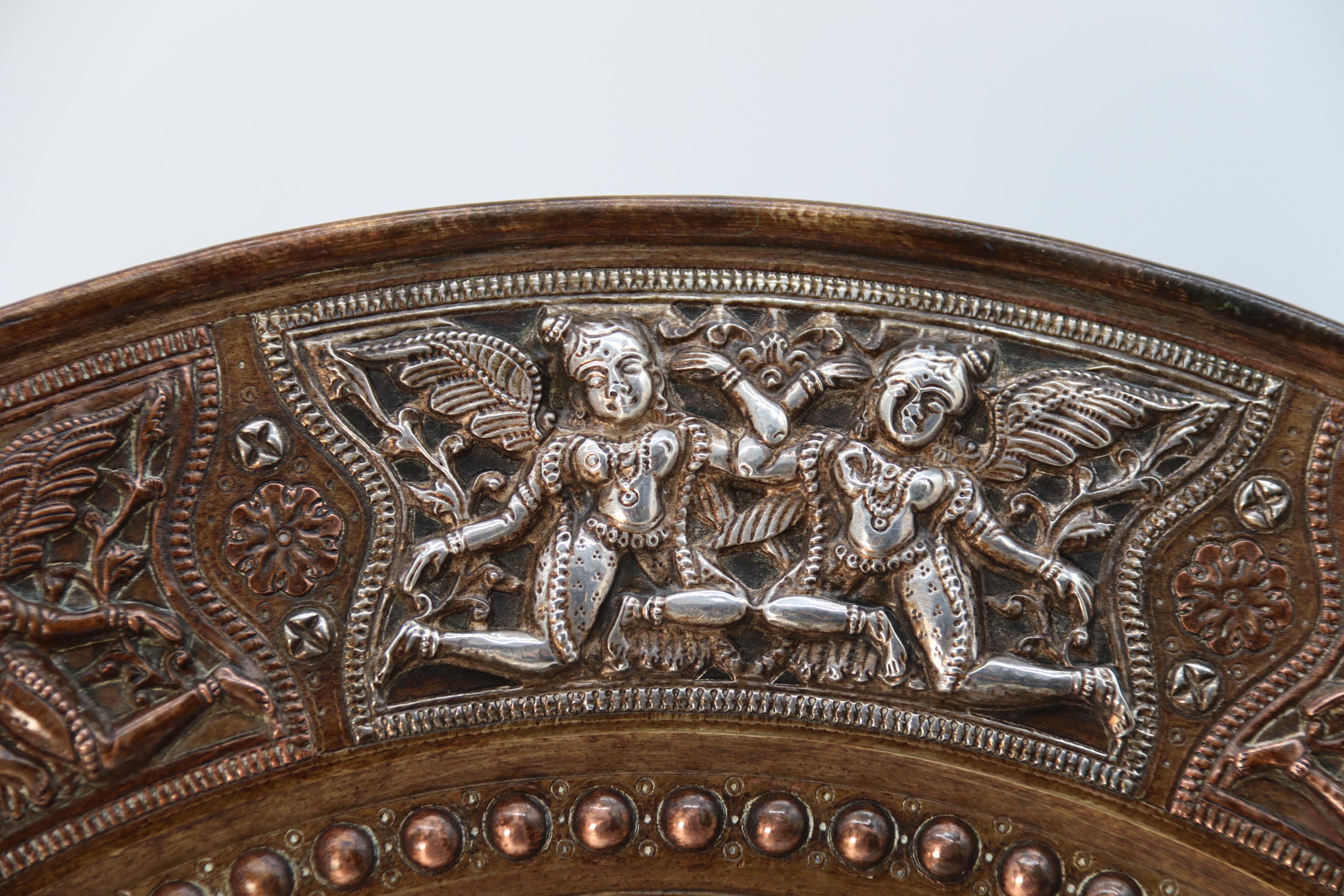 Silver A Raj period silver, copper and brass repousse work charger, Indian circa 1900 For Sale